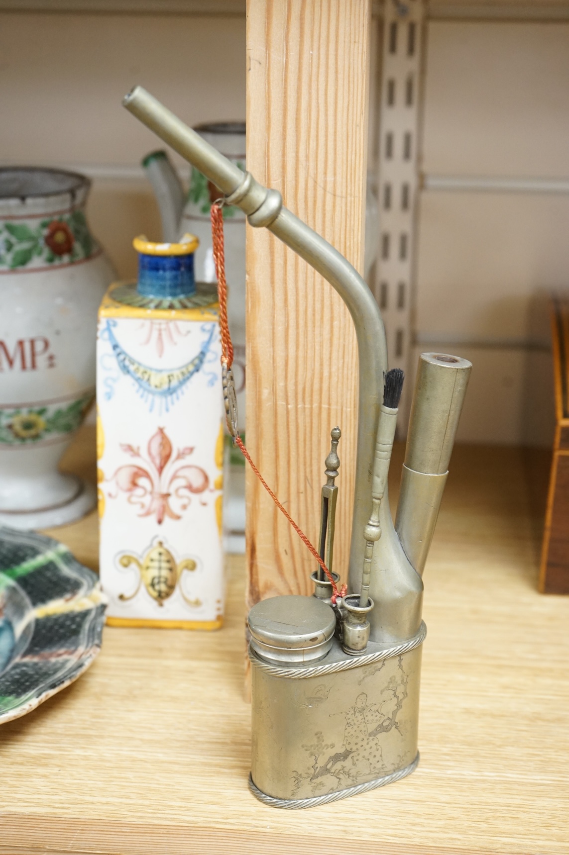 An early 20th century Chinese paktong water pipe, stamped maker’s mark, 26cm high